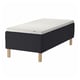 STAVANGER bed: black quilted fabric, oak legs, rectangular, minimalist design.