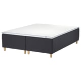 Black IKEA STAVANGER bed with memory foam mattress and wooden base.