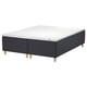 Black IKEA STAVANGER bed with memory foam mattress and wooden base.