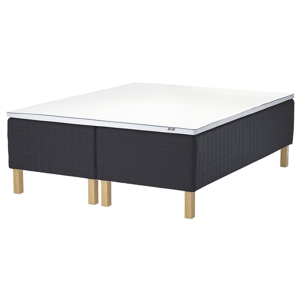 New STAVANGER bed: black, square, foam & metal base, light wood legs.