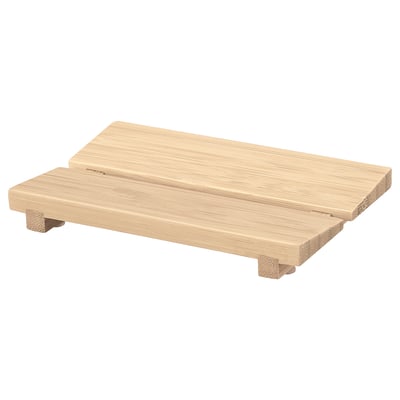 A wooden product named STEGESUND. Its light brown, rectangular, with four small legs, and a smooth, flat surface.