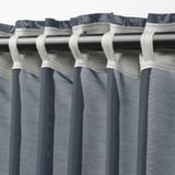 Curtains with loops on rod, sheer fabric, stripe pattern, blue-gray, soft light diffusion.