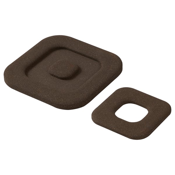 Two piece cork kitchen accessory, brown, rectangular with rounded corners and cutout.