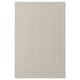 A beige STENSUND cabinet door with a smooth, framed design. Made of fibreboard, it has a lacquered finish that resists moisture and stains.