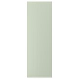 A green STENSUND cabinet door with vertical grooves, made of fibreboard and lacquered for easy cleaning.