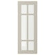 Option: A beige STENSUND cabinet door with a grid glass design.