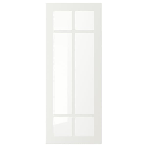 A white STENSUND cabinet door with a frosted glass panel. It has a rectangular shape with a sleek, modern design, suited for kitchen cabinets.