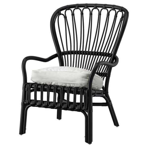 Black rattan chair with white cushion, curved back, armrests. Modern & comfortable.