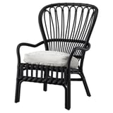 Black rattan chair with white cushion, curved back, armrests. Modern & comfortable.