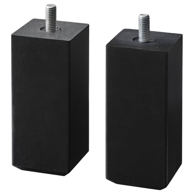 Two black cubic wooden STUBBARP legs with metal screws on top, providing adjustable support.