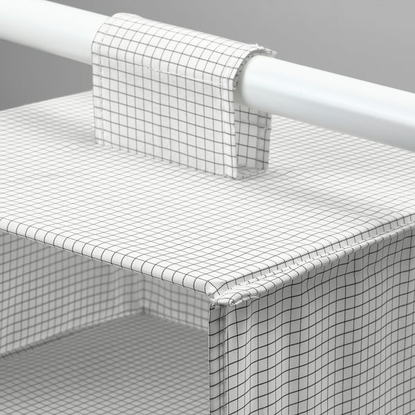 Foldable hanging storage with white checkered pattern. Crafted from durable acrylic and recycled polyester.