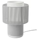 Option: A modern white SYMFONISK lamp speaker with a cylindrical shape and textured fabric lampshade.