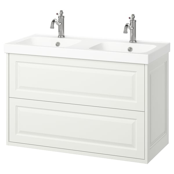 A white TÄNNFORSEN double sink vanity with two drawers and chrome faucets.