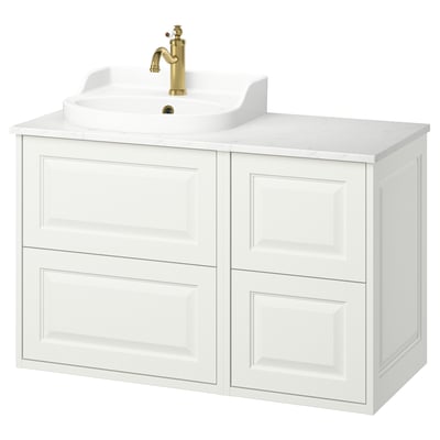 White TÄNNFORSEN bathroom vanity with marble counter, gold faucet.