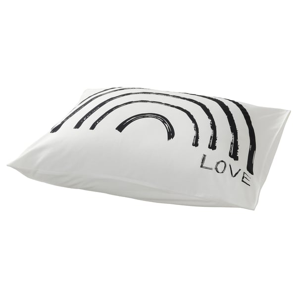 A TAPETMAL pillowcase, white with a black rainbow design, soft cotton/viscose blend, rectangular shape.