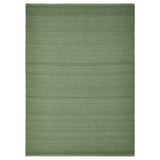 This image shows the TIDTABELL, a green rectangular rug with a wool surface and cotton backing. Its flatwoven and a subtle melange pattern.