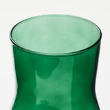 A sleek, dark green glass vase with smooth, curved sides and a wide opening.