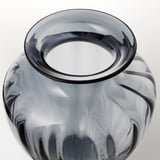 Glass vase, handcrafted, swirling gray patterns, smooth rim.