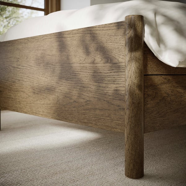 Close-up of well-crafted wooden bed frame showing sturdy design and fine grain texture.
