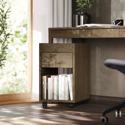 Home office with TONSTAD wooden drawer unit beside desk, holding books & papers.