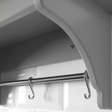 Modern wall shelf with hooks, made with high-quality materials.