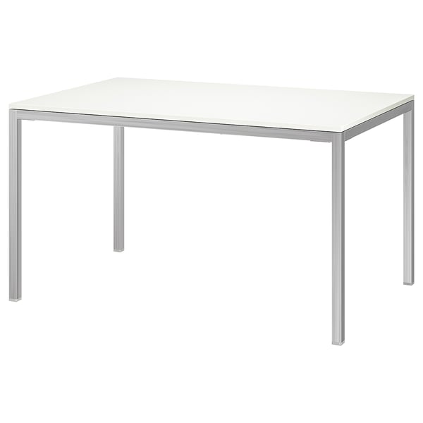TORSBY table in chrome and white, modern design with glossy top and metal legs.