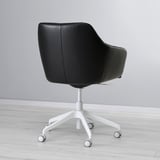 Black office chair with curves, padding, casters, lumbar support.