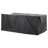 A black TOSTERÖ outdoor furniture cover, rectangular, waterproof, made from polyester, designed to protect an 8-seat garden dining set.