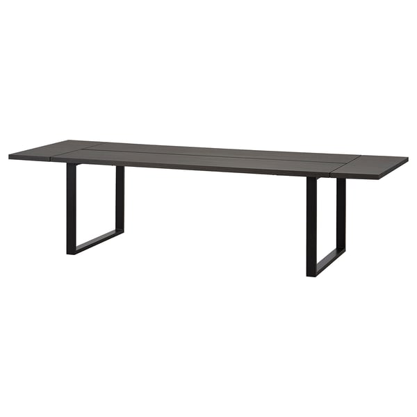 A dark gray TRANEBO dining table with metal legs and a rectangular shape, perfect for modern dining spaces.
