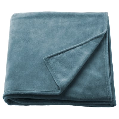 A folded light blue fleece blanket, soft and fluffy, made of 100% recycled polyester.