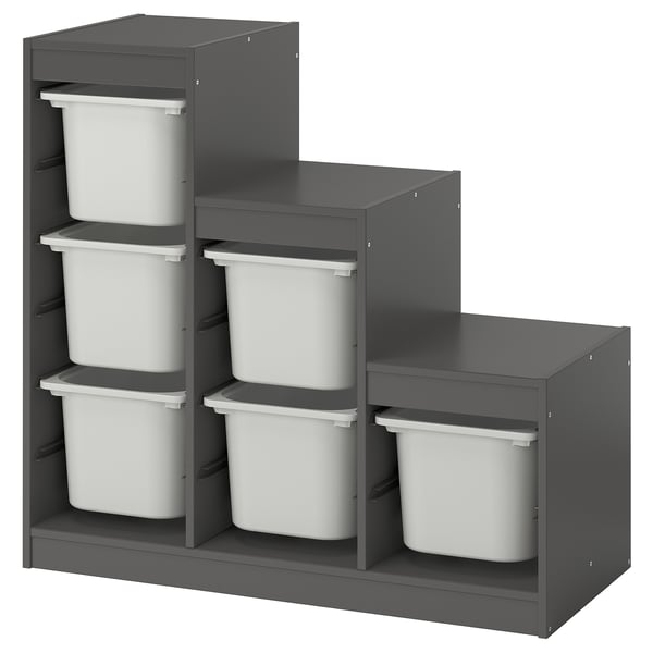 Ikea TROFAST: gray modular storage with six white plastic bins, arranged in two stacked units for organizing kids items.
