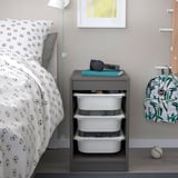TROFAST gray storage with drawers, soccer bedding, and kids items.