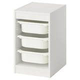 A white TROFAST storage unit with four green-rimmed plastic drawers, designed for children.