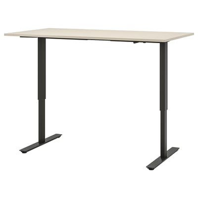 Trotton adjustable standing desk, beige top, black metal legs, rectangular shape.