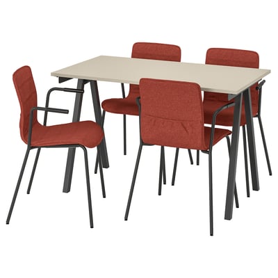 A TROTTEN modern dining set with a light beige table and four red chairs featuring black metal frames.