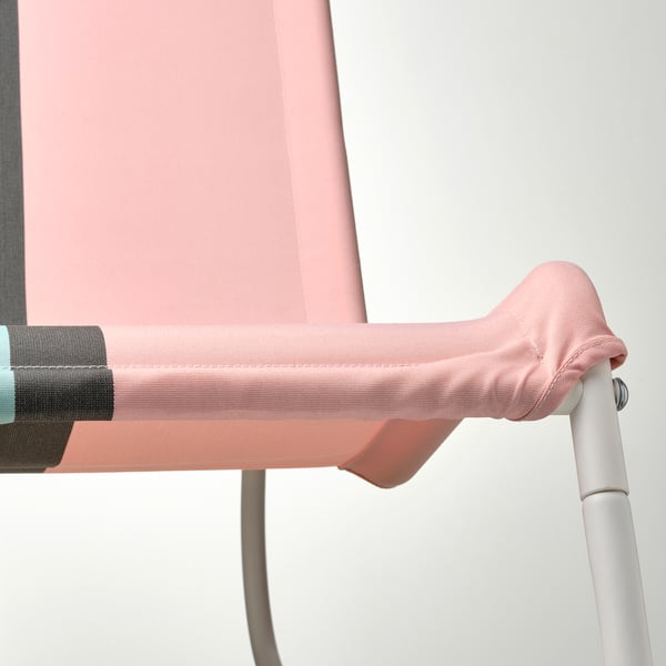 Pink outdoor rocking chairs armrest close-up, showcasing durable, stitching details, and smooth fabric.