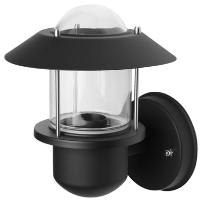 Black wall lamp UPPLID with clear glass shade, steel & polycarbonate. Round, modern design, suitable for outdoor use.