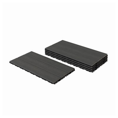 Two stacks of black wood-like composite deck tiles. Rectangle shape with grooved design. Easy to assemble, outdoor use.