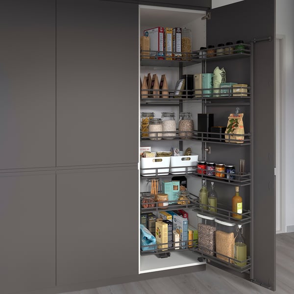 Open pantry with gray baskets showing organized food items, easy to access.