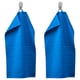 Two blue VÅGSJÖN towels hang neatly from silver hooks, showcasing their textured, ribbed design and soft cotton material.