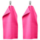 Bright pink VÅGSJÖN towels hang side by side on hangers, soft, absorbent, textured.