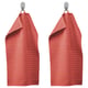 Two red VÅGSJÖN towels hang with hooks, soft and quick-drying terry.