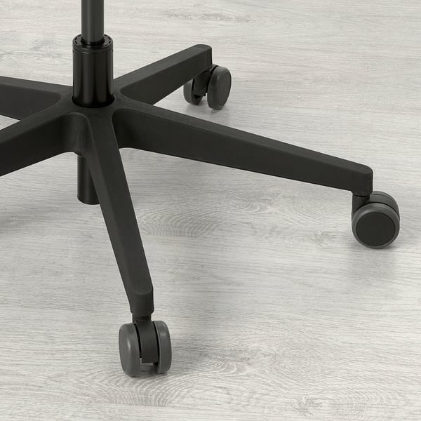 Close-up of durable office chair base and castors.