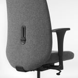 Adjustable office chair armrests in close-up, highlighting durable materials and sleek design.