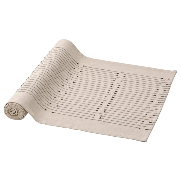 VÅRARV natural-colored cotton and jute table runner with subtle pattern and small tassels for a rustic swedish look.
