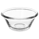 Clear glass bowl, simple and round, no decorations, ideal for serving food.