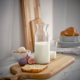 VARDAGEN glass carafe, clear, on wooden board with food, size: medium