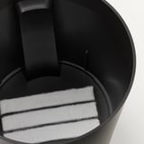 Self-watering planter with filter, large opening, wheels, water level indicator.