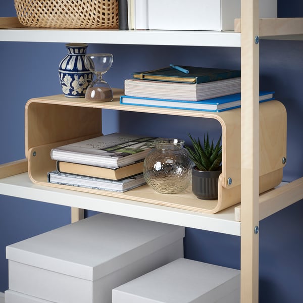 Wooden VATTENKAR monitor stand on shelf, supports monitor for ergonomics, holds books and small items.