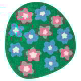 The VATTENSKRUV bath mat is green with pink and blue flowers, soft, round, and eco-friendly.